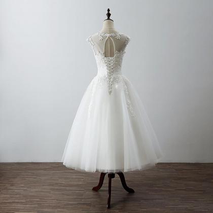 White Tea Length Ball Tulle With Lace Applique..