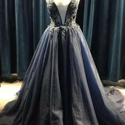 Beautiful Black Tulle V-neckline Beaded Prom Dress..