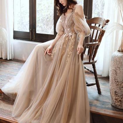 Beautiful Puffy Sleeves Champagne Floor Length..
