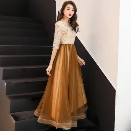 Beautiful Tulle Gold A-line Long Evening Dress..