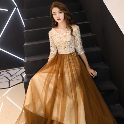 Beautiful Tulle Gold A-line Long Evening Dress..