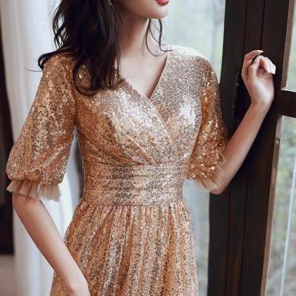Beautiful Golden Sequins V-neckline Long..